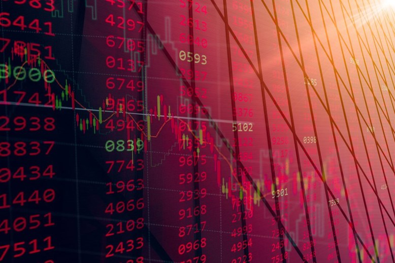 Abstract visual of market data overlayed onto a skyscraper