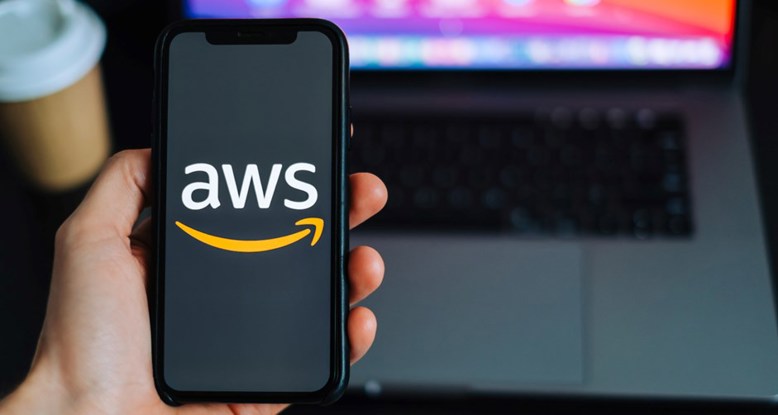 Photograph of a smartphone with the AWS logo on the screen