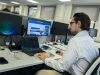 Photograph showing a 2i employee at work